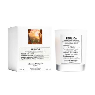 Maison Margiela Replica on a date scented Candle.